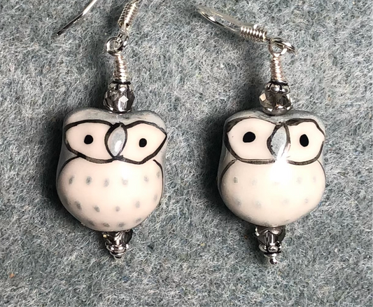 Gray and white ceramic spotted owl bead earrings adorned with clear Chinese crystal beads.