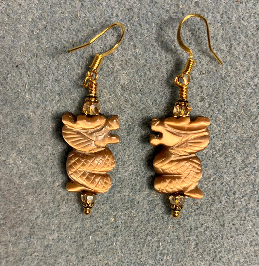 Tan fiber optic (cat’s eye) gemstone dragon bead earrings adorned with amber Chinese crystal beads.