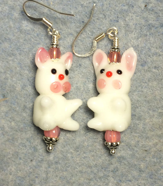 White and pink lamp work bunny rabbit bead earrings adorned with pink Czech glass beads.
