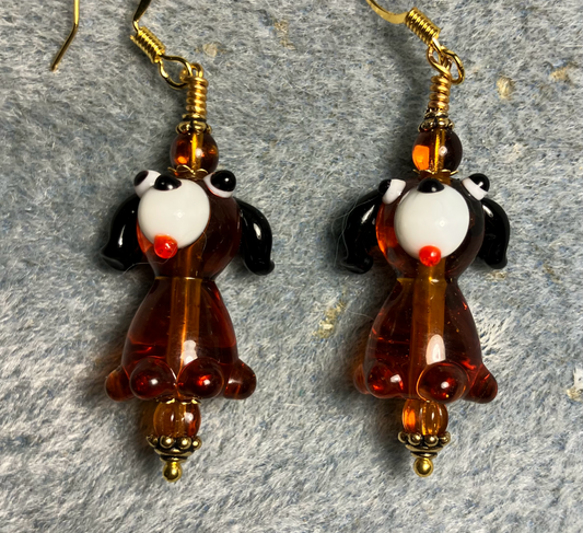 Caramel brown lamp work puppy dog bead earrings adorned with caramel Czech glass beads.