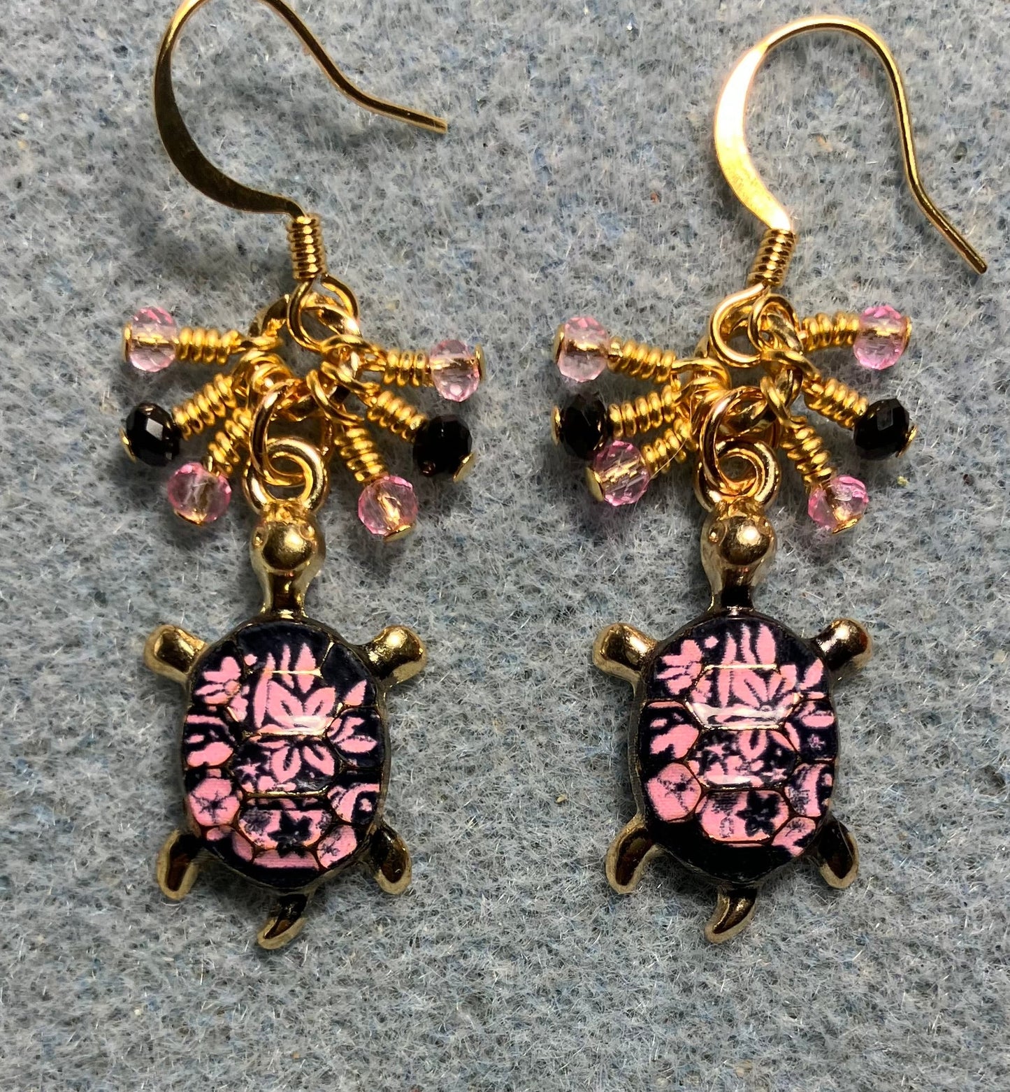Pink and black enamel turtle charm earrings adorned with tiny dangling pink and black Chinese crystal beads.