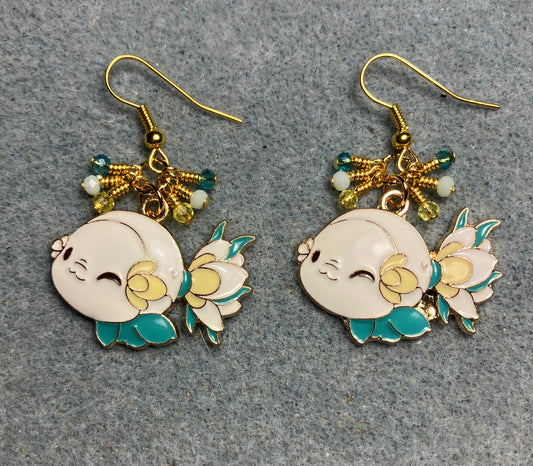 Large white, yellow, and turquoise enamel fish charm earrings adorned with tiny dangling white, yellow, and turquoise Chinese crystal beads.