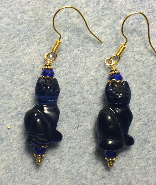 Dark blue fiber optic (cat’s eye) cat bead earrings adorned with dark blue Chinese crystal beads.