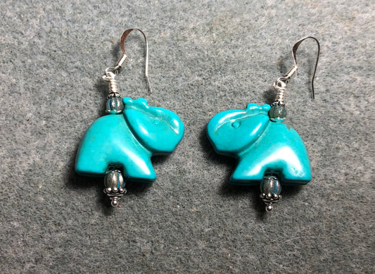 Turquoise howlite gemstone elephant bead earrings adorned with turquoise Chinese crystal beads.