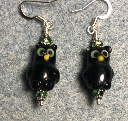 Black and green lamp work owl bead earrings adorned with sparkly green Chinese crystal beads.