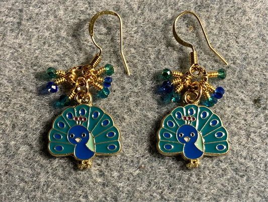 Turquoise and dark blue enamel peacock charm earrings adorned with tiny dangling turquoise and dark blue Chinese crystal beads.