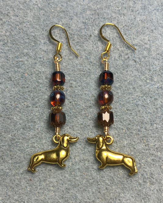 Gold dachshund charm earrings adorned with brown Czech glass beads