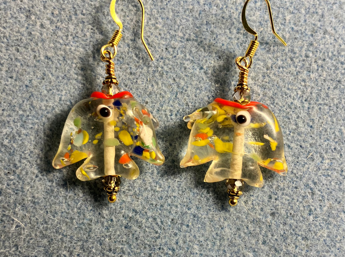 Transparent yellow and red lamp work spotted angelfish bead earrings adorned with clear Chinese crystal beads.