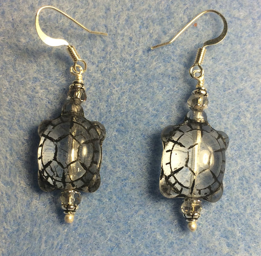 Clear (with black inlay) Czech glass turtle bead earrings adorned with clear Chinese crystal beads.