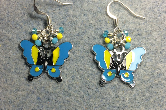 Turquoise and yellow enamel butterfly charm earrings adorned with tiny dangling turquoise and yellow Chinese crystal beads.