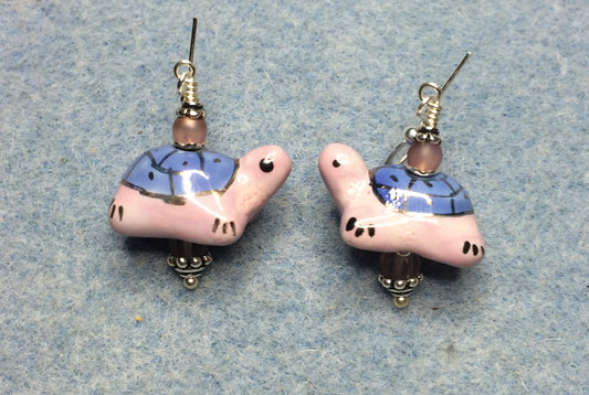 Pink and blue ceramic turtle bead earrings adorned with pink Czech glass beads.