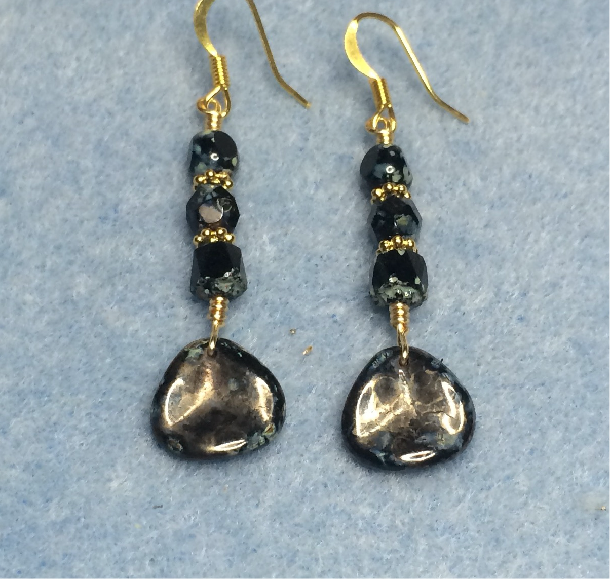 Black Picasso Czech glass rose petal earrings adorned with black Picasso Czech glass beads.