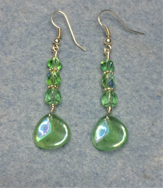 Light green Czech glass rose petal earrings adorned with light green Czech glass beads.