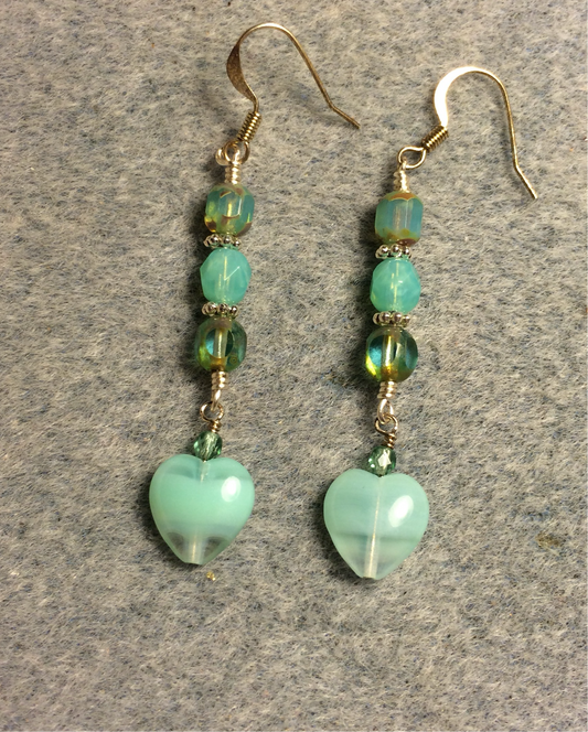 Small seafoam blue green Czech glass heart bead earrings adorned with blue green Czech glass beads.