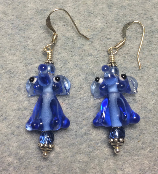 Translucent blue lamp work sitting elephant bead earrings adorned with blue Czech glass beads.