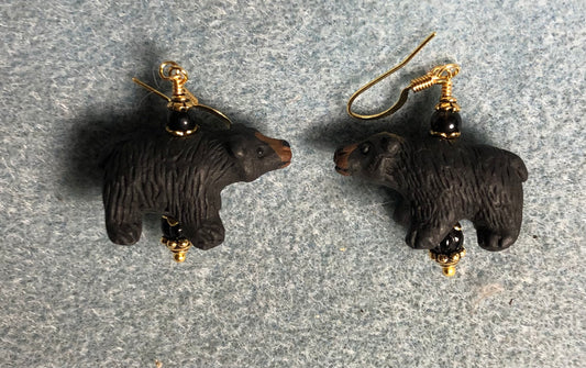 Black ceramic bear bead earrings adorned with black Czech glass beads.