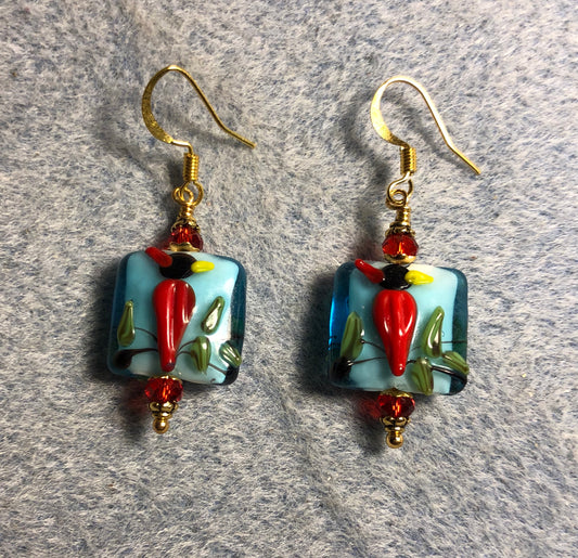 Red lamp work cardinal bead earrings adorned with red Chinese crystal beads.