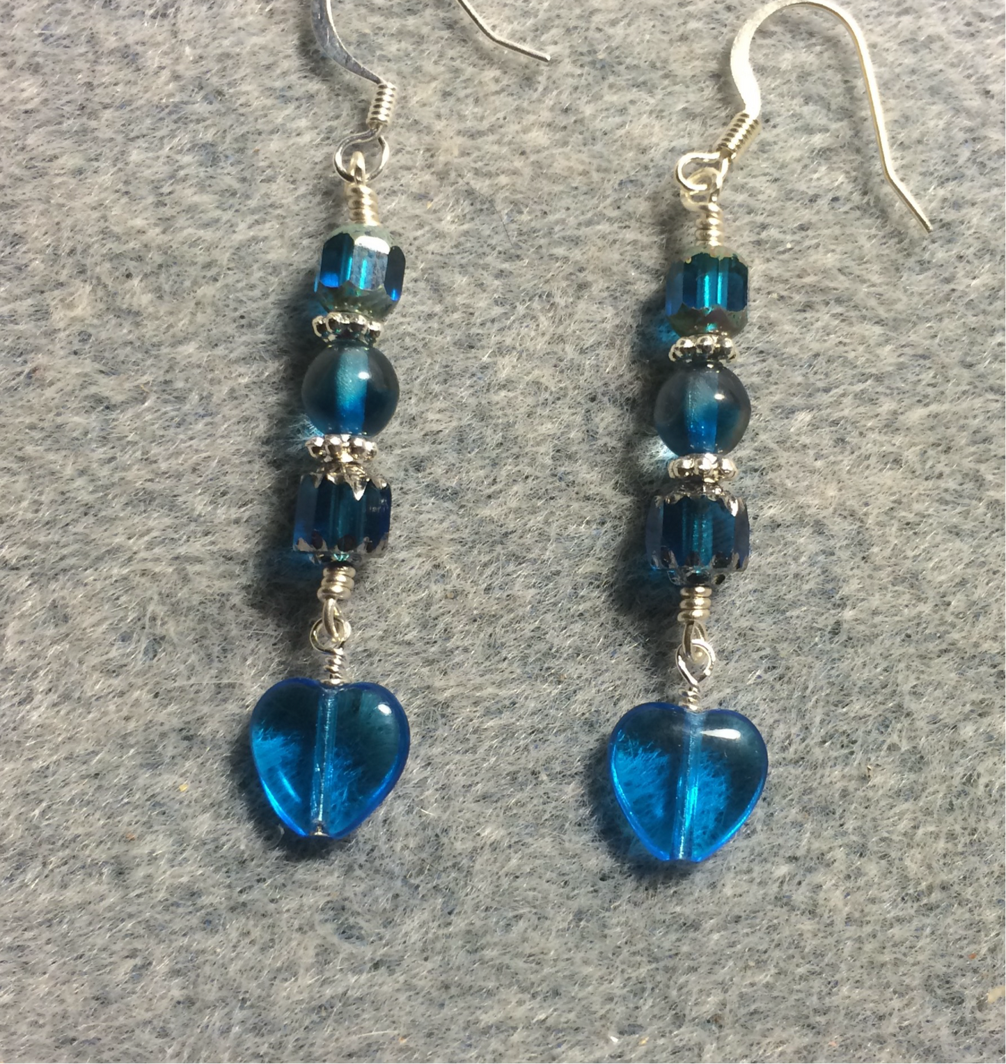Small bright blue Czech glass heart bead earrings adorned with bright blue Czech glass beads.