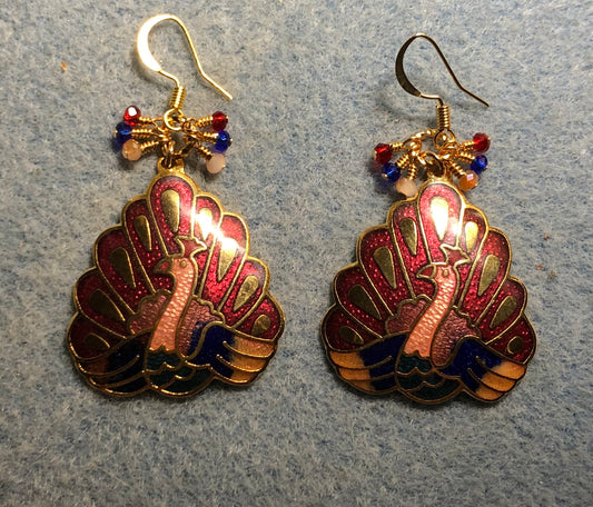 Dark red, peach, and blue cloisonné peacock charm earrings adorned with tiny dark red, peach, and blue Chinese crystal beads.