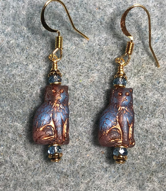 Small light blue and copper Czech glass cat bead earrings adorned with light blue Chinese crystal beads.