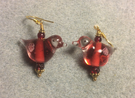 Translucent dark red lamp work songbird bead earrings adorned with dark red Czech glass beads.