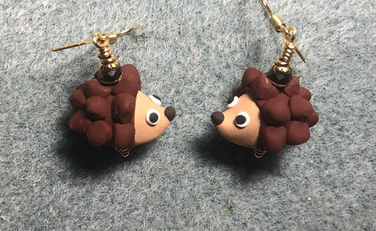 Brown and tan polymer clay hedgehog bead earrings adorned with brown Chinese crystal beads.