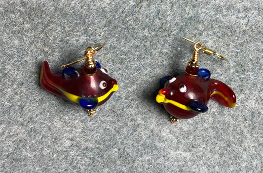 Dark red, blue, and yellow lamp work fish bead earrings adorned with dark red Chinese crystal beads.