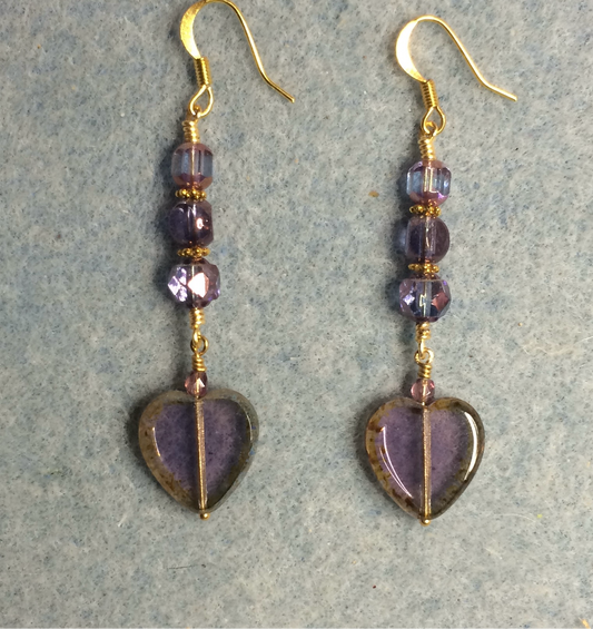 Translucent violet Czech glass heart bead earrings adorned with violet Czech glass beads.