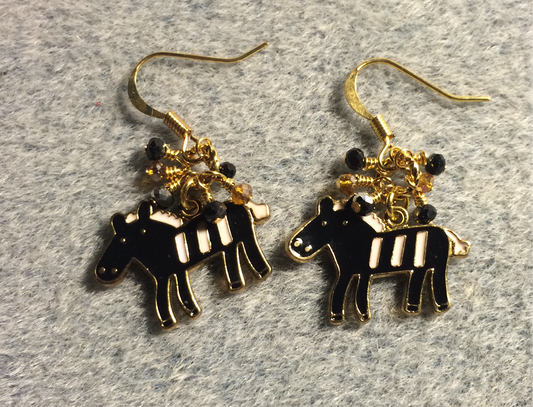Black and white enamel horse charm earrings adorned with tiny dangling black and amber Chinese crystal beads.