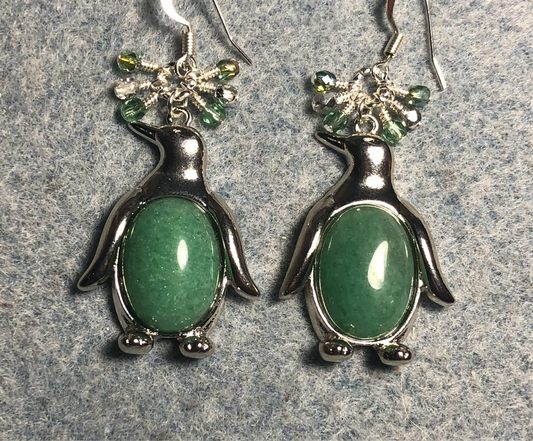 Large silver and green aventurine gemstone penguin charm earrings adorned with small dangling green and silver Czech glass beads.