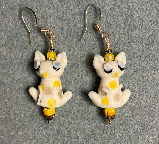 White and yellow lamp work cat bead earrings adorned with yellow Czech glass beads.