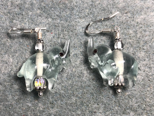 Clear lamp work elephant bead earrings adorned with clear Czech glass beads.