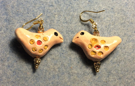 Medium peach, yellow, and red ceramic songbird bead earrings adorned with rose gold Chinese crystal beads.