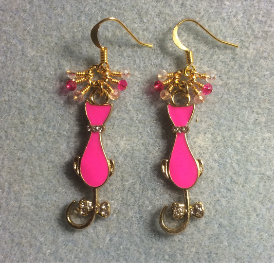 Hot pink and gold enamel cat charm earrings adorned with tiny dangling hot pink and gold Chinese crystal beads.