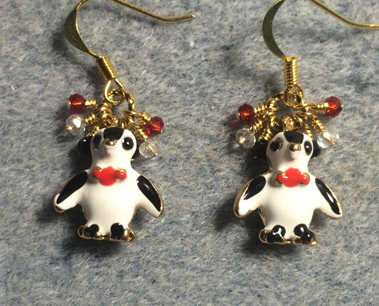 Black, white, and red enamel penguin charm earrings adorned with tiny dangling black, clear, and red Chinese crystal beads.