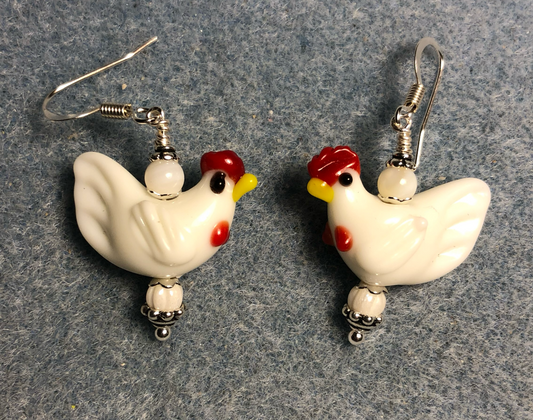White lamp work chicken bead earrings adorned with white Czech glass beads.