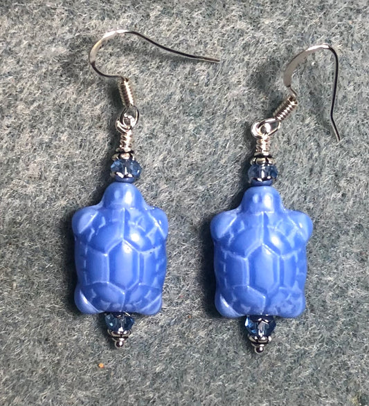 Opaque light blue Czech glass turtle bead earrings adorned with light blue Chinese crystal beads.