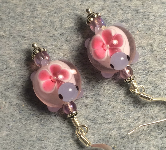 Pink and lavender lamp work turtle bead earrings adorned with lavender Czech glass beads.