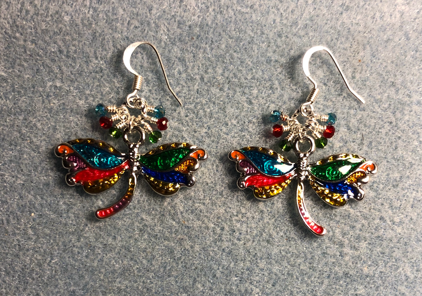 Green, turquoise, and red dragonfly charm earrings adorned with tiny dangling green, turquoise, and red Chinese crystal beads.