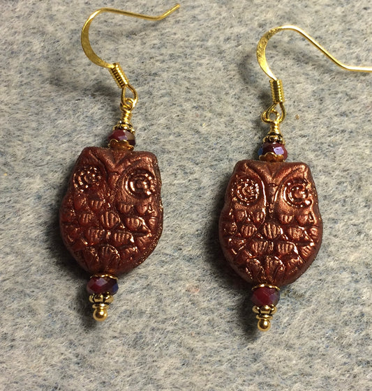 Dark red (with dark red wash) Czech glass owl bead earrings adorned with dark red Chinese crystal beads.