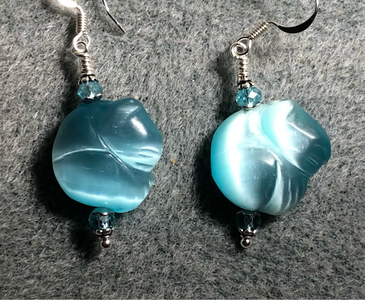 Turquoise fiber optic (cat’s eye) sleeping cat bead earrings adorned with turquoise Chinese crystal beads.