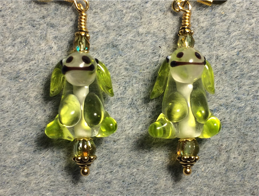 Lime green and clear lamp work puppy dog bead earrings adorned with lime green Czech glass beads.