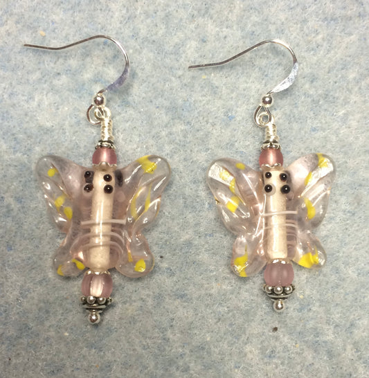 Light pink lamp work butterfly bead earrings adorned with light pink Czech glass beads.