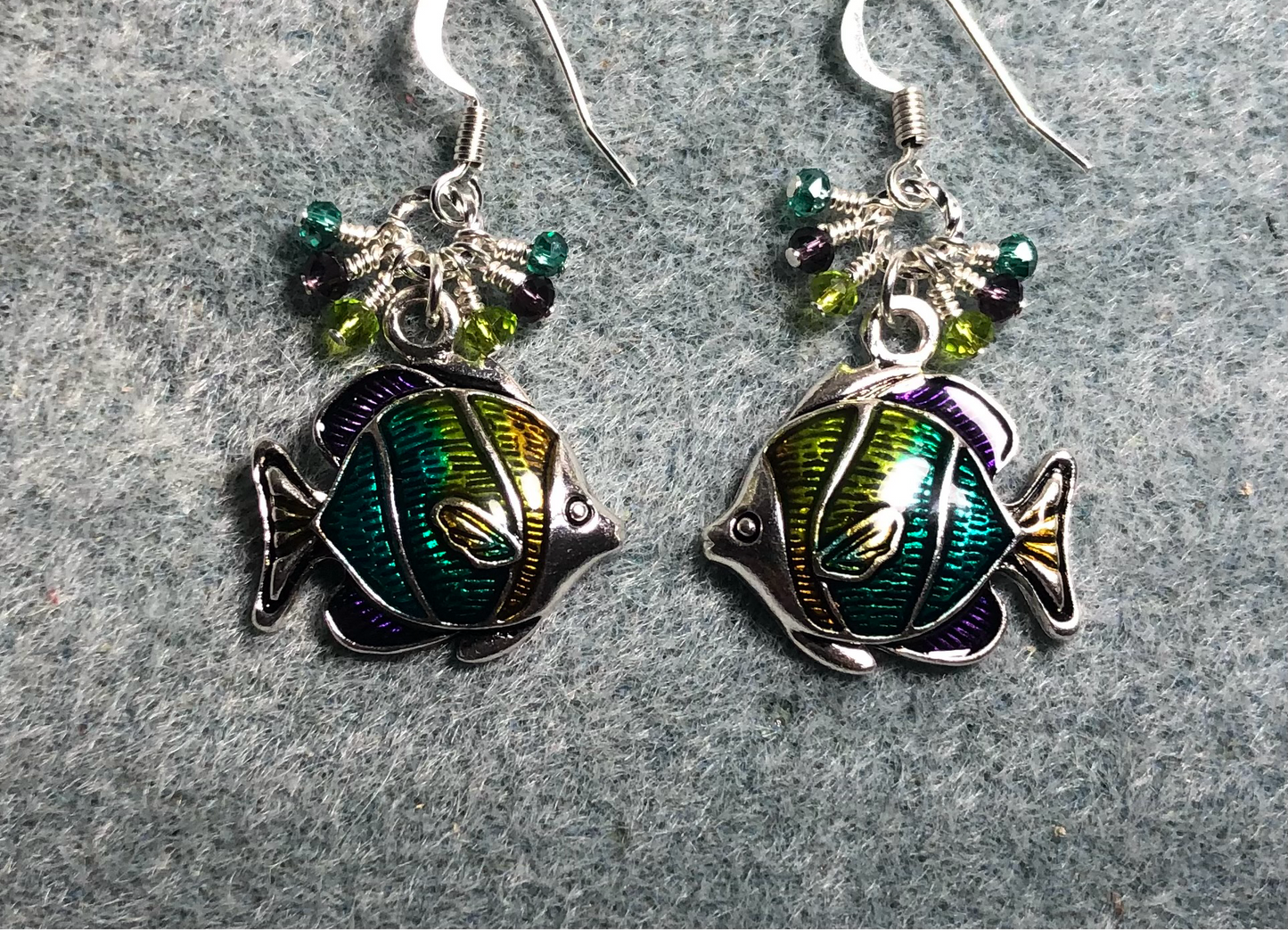 Olive green, teal, and purple enamel angelfish charm earrings adorned with tiny dangling olive green, teal, and purple Chinese crystal beads.