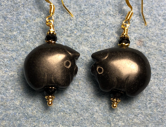 Black onyx gemstone pig bead earrings adorned with black Chinese crystal beads.