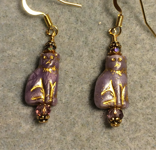 Small violet (with gold inlay) Czech glass cat bead earrings adorned with violet Chinese crystal beads.
