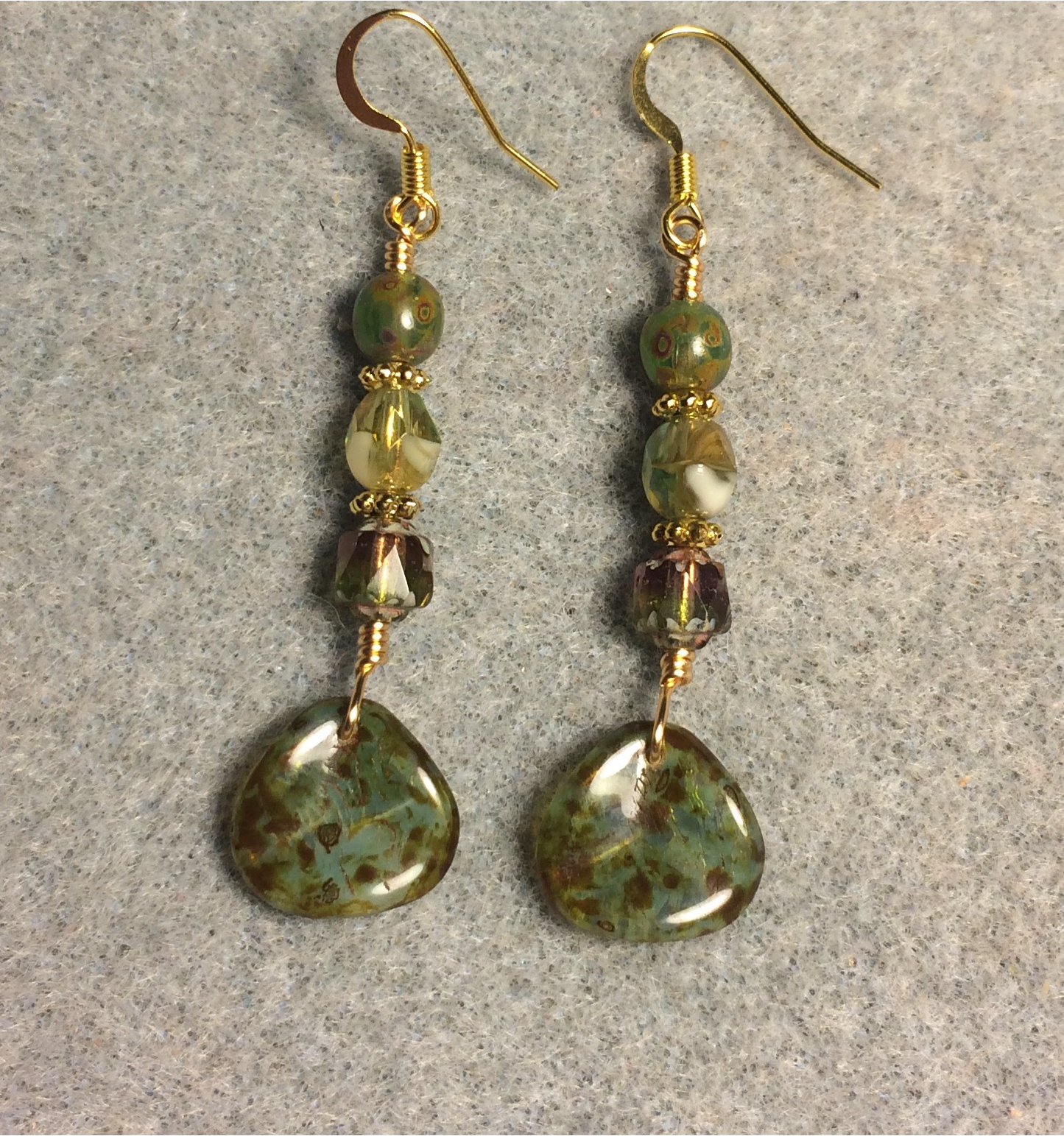 Green Picasso Czech glass rose petal earrings adorned with green Picasso Czech glass beads.