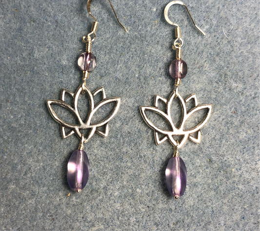 Silver lotus flower connector charm earrings adorned with metallic violet Czech glass drop beads and metallic violet Czech glass beads.