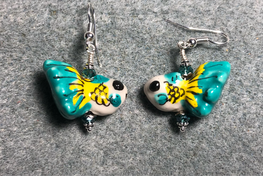 Turquoise and yellow ceramic goldfish bead earrings adorned with turquoise Chinese crystal beads.