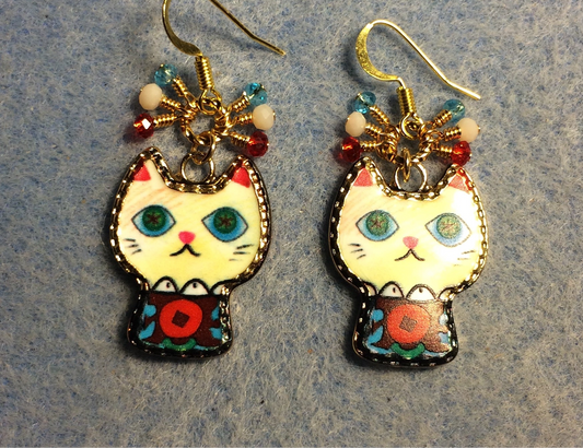 White, red, and turquoise enamel cat charm earrings adorned with tiny dangling white, red, and turquoise Chinese crystal beads.